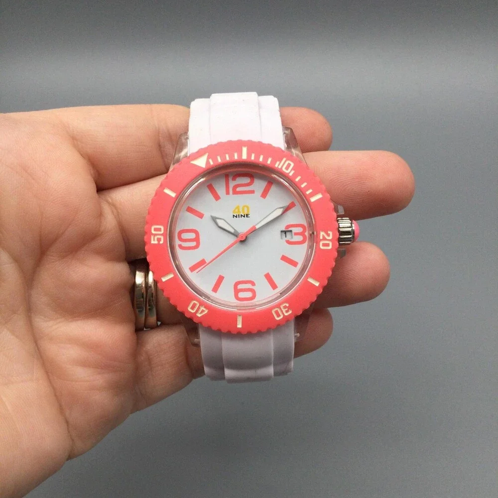 40nine Womens Watch 40mm Pink Case White Silicone Strap Date Quartz 50m
